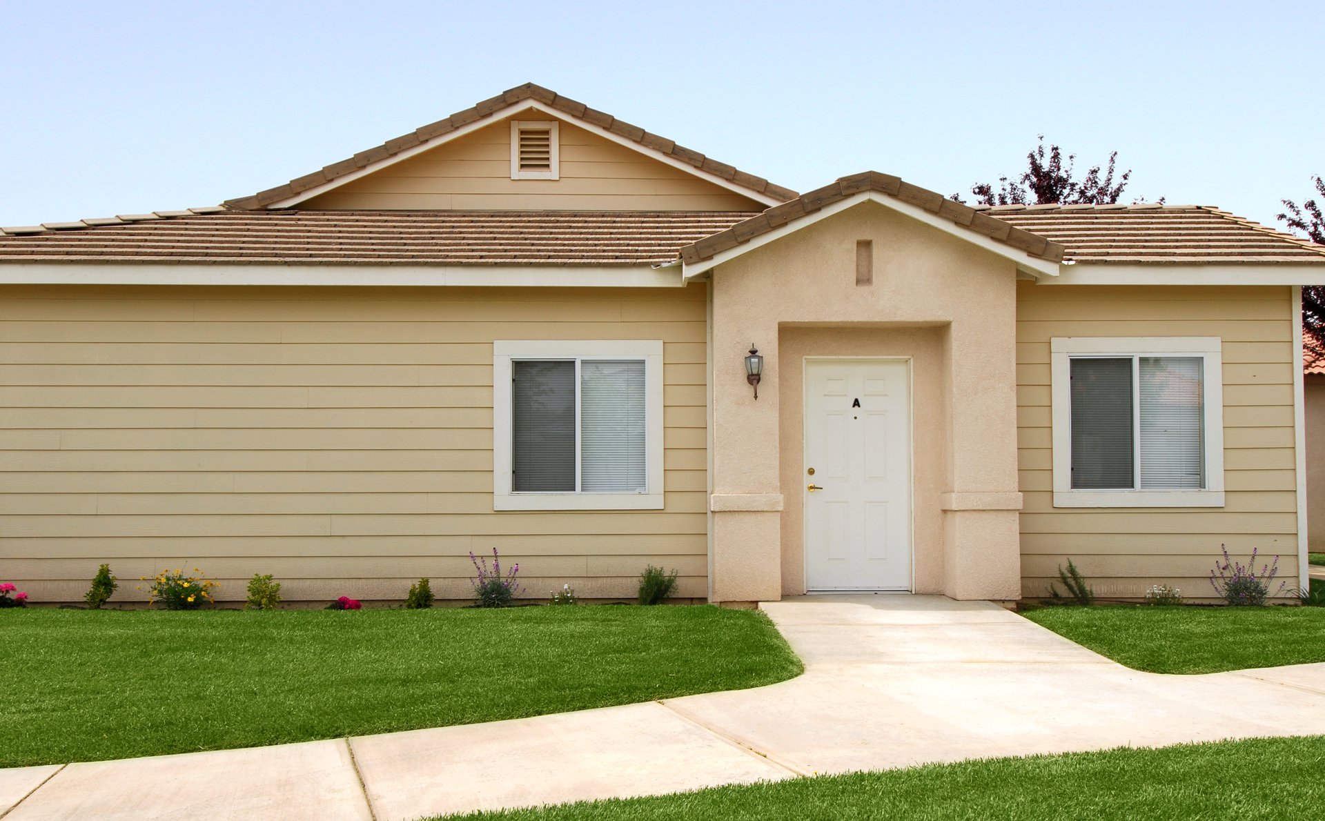 a large lawn in front of a house