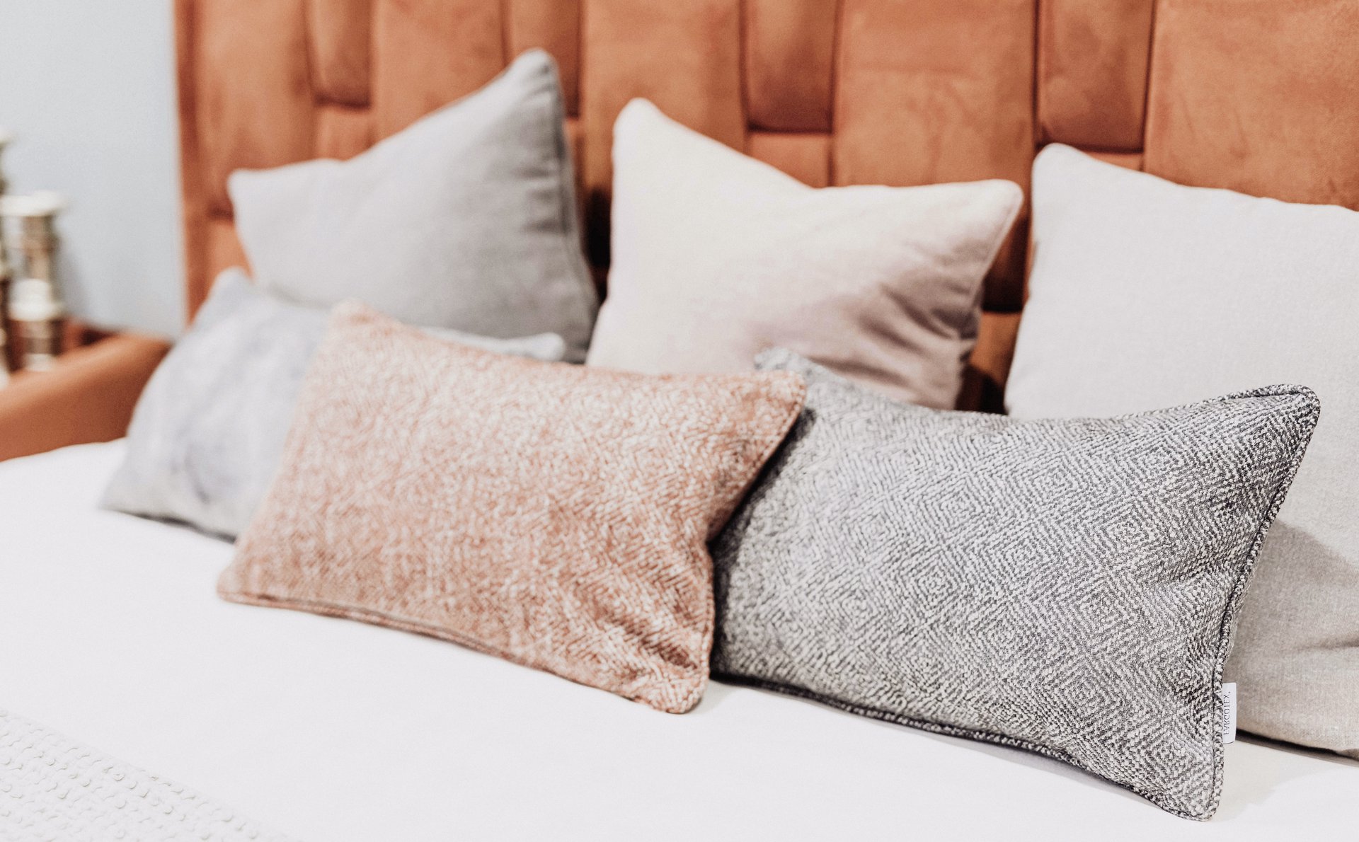 pillows on top of a bed