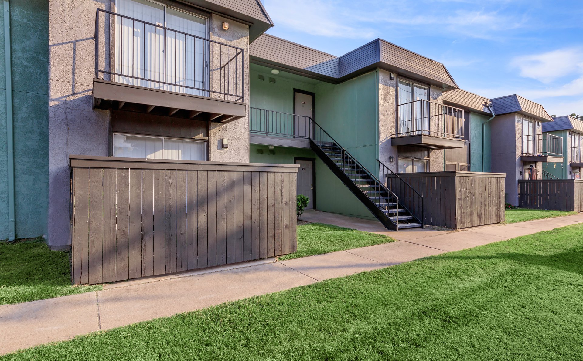 a large lawn in front of a building