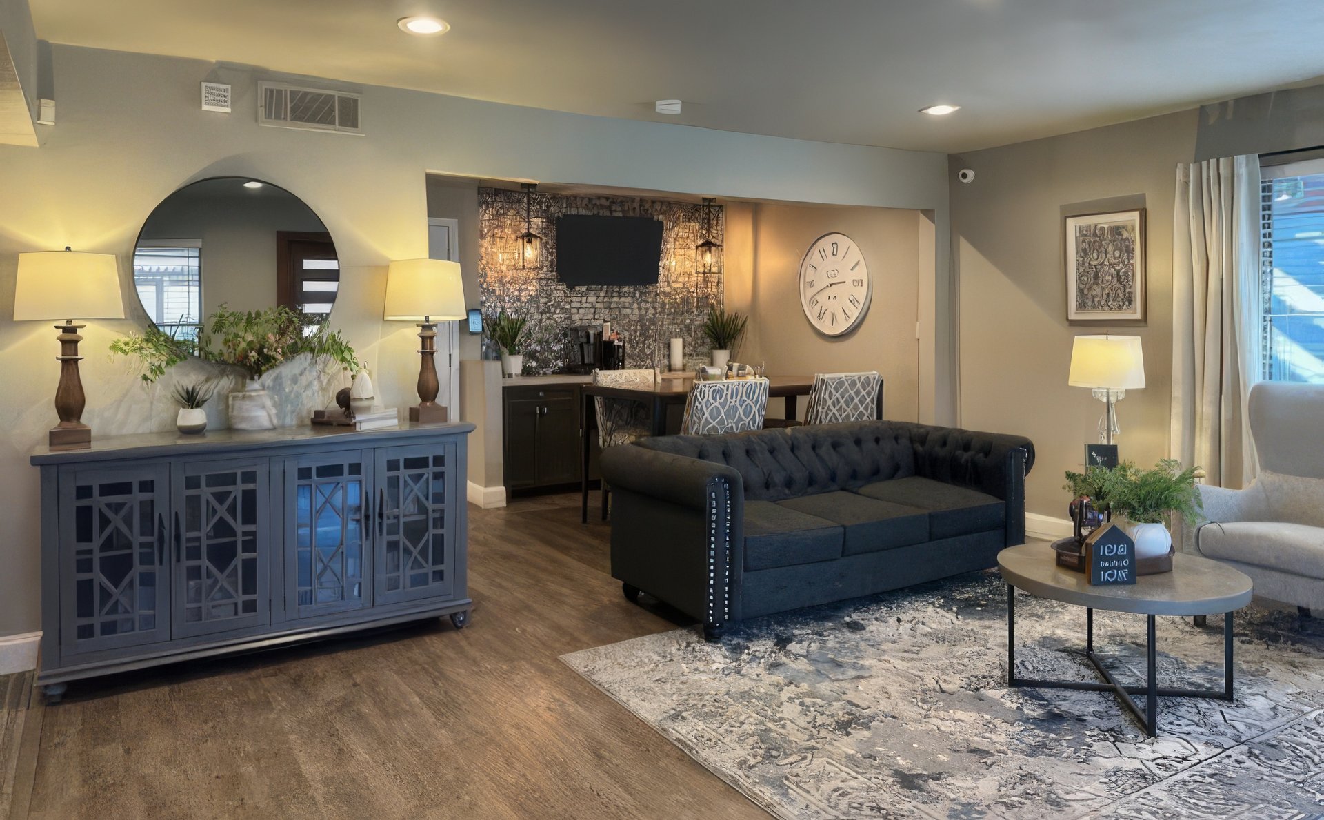 a living room filled with furniture and a fireplace