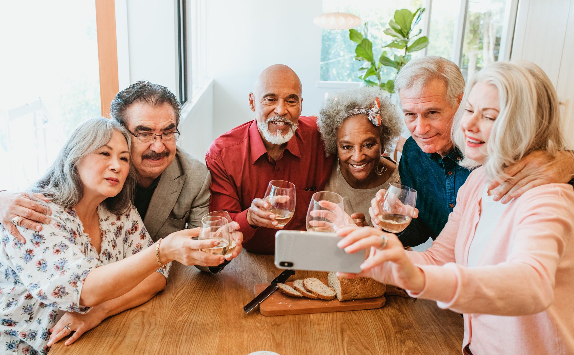 a group of people sitting at a table