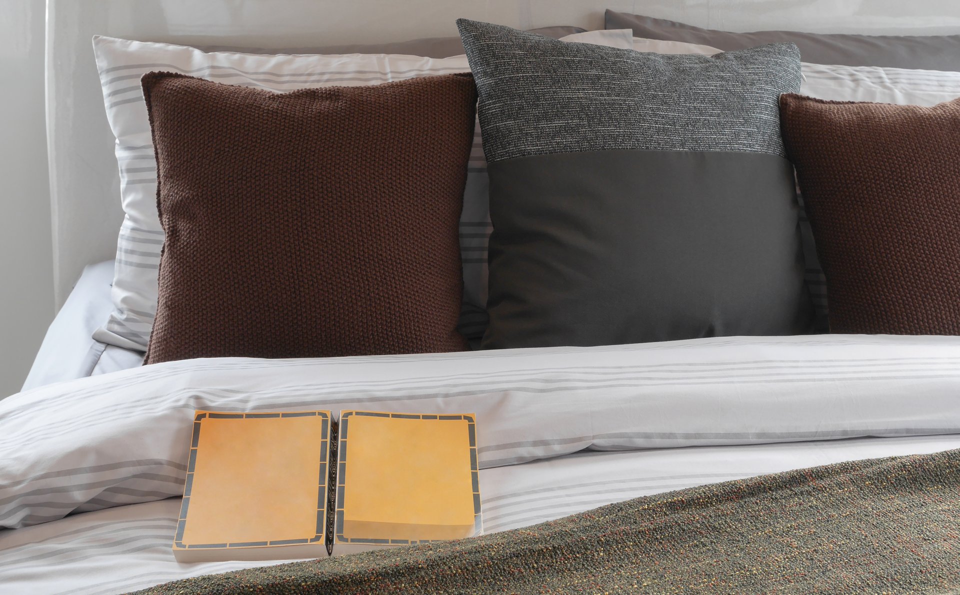 a made bed in a room