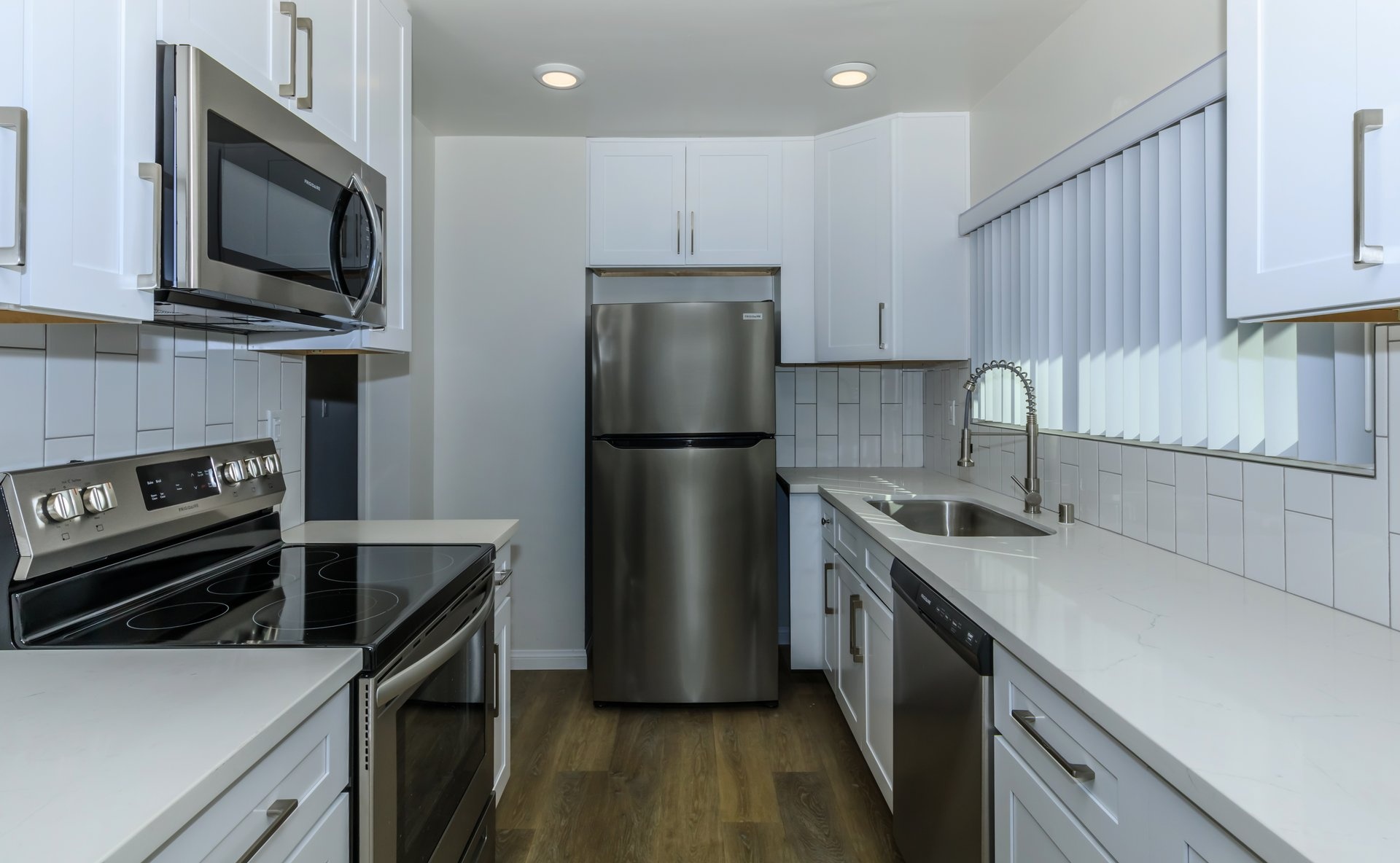 a kitchen with stainless steel appliances