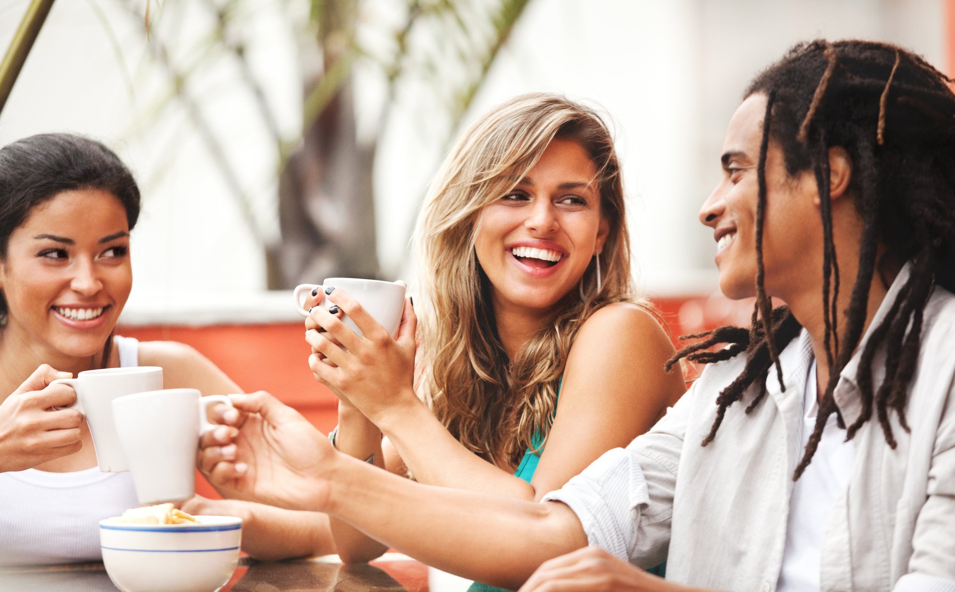 a group of people sitting at a table