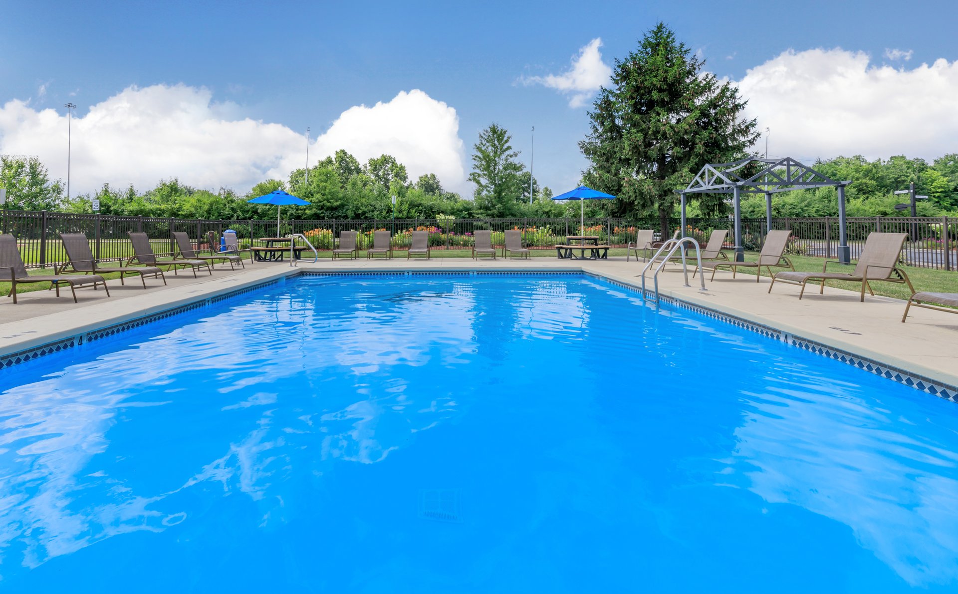 a pool next to a body of water