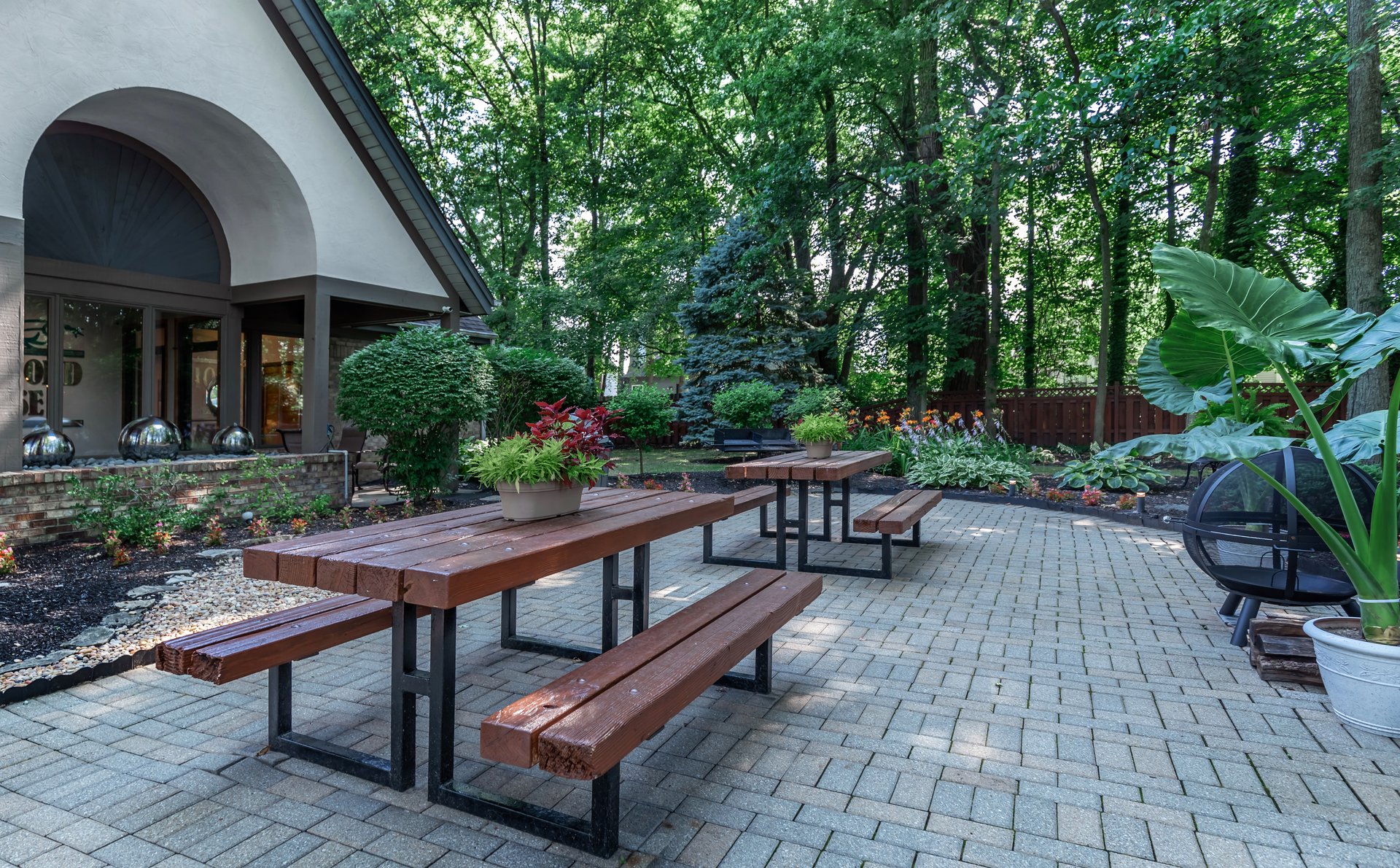 a wooden bench in front of a building