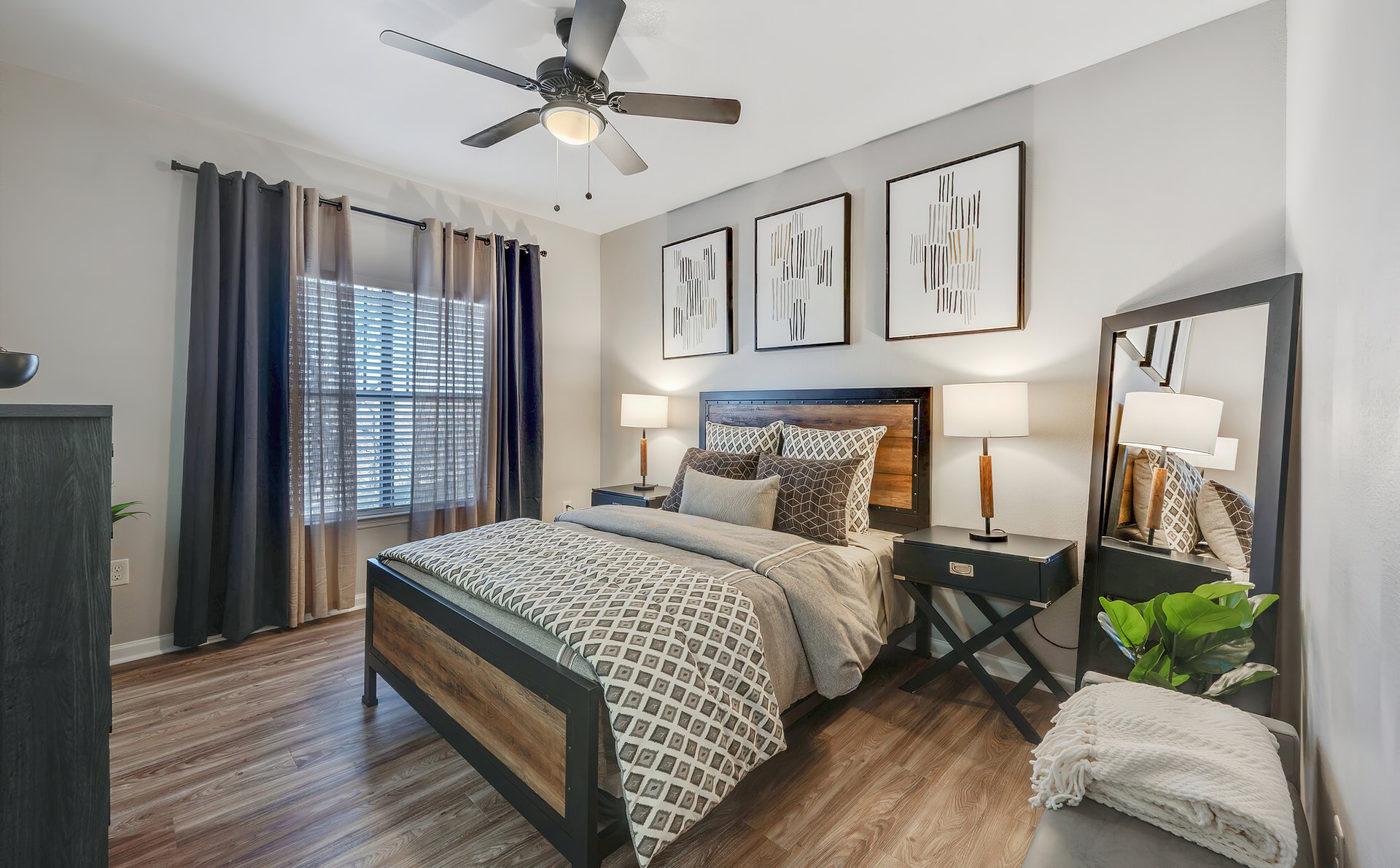 a bedroom with a large bed in a room
