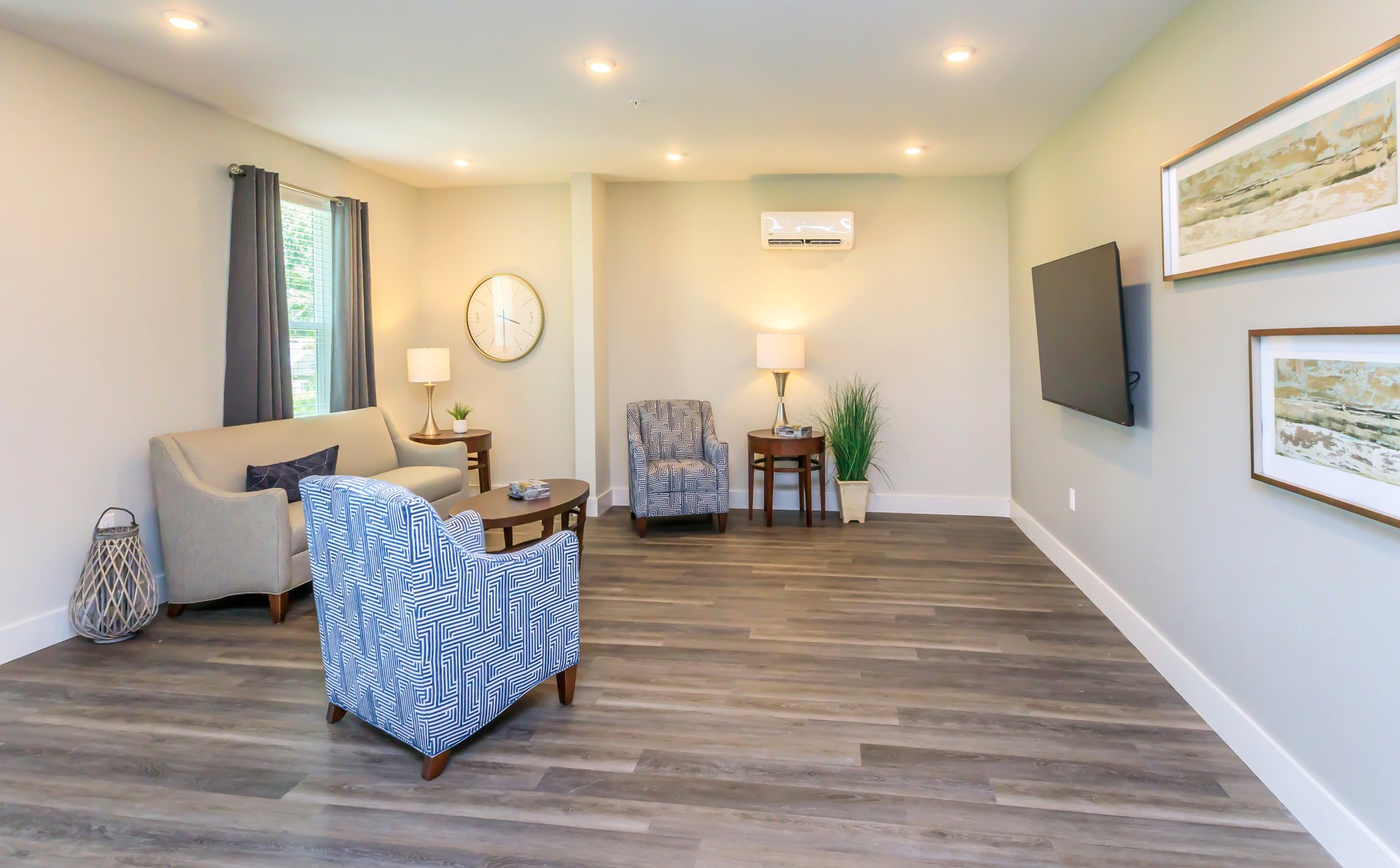 a living room filled with furniture and a fireplace