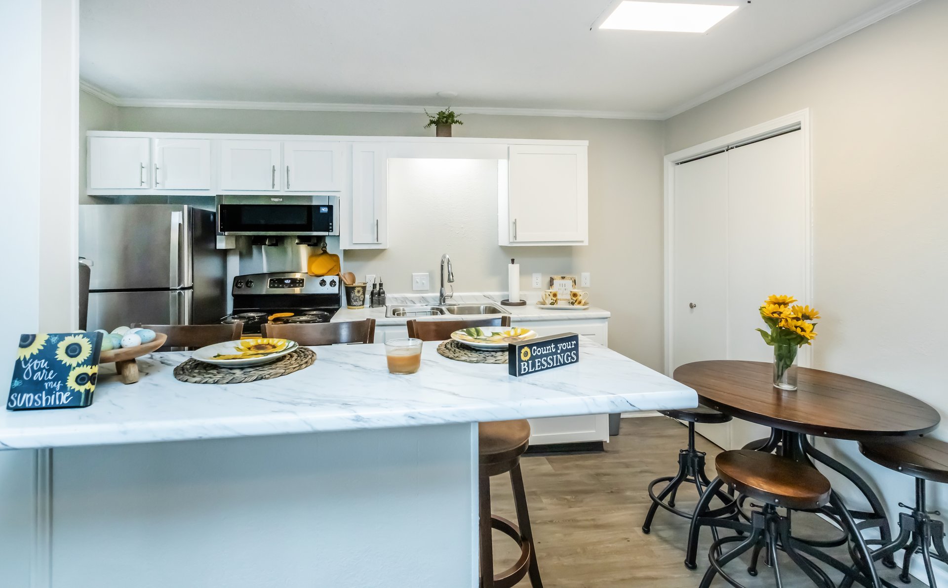 a kitchen with a dining table