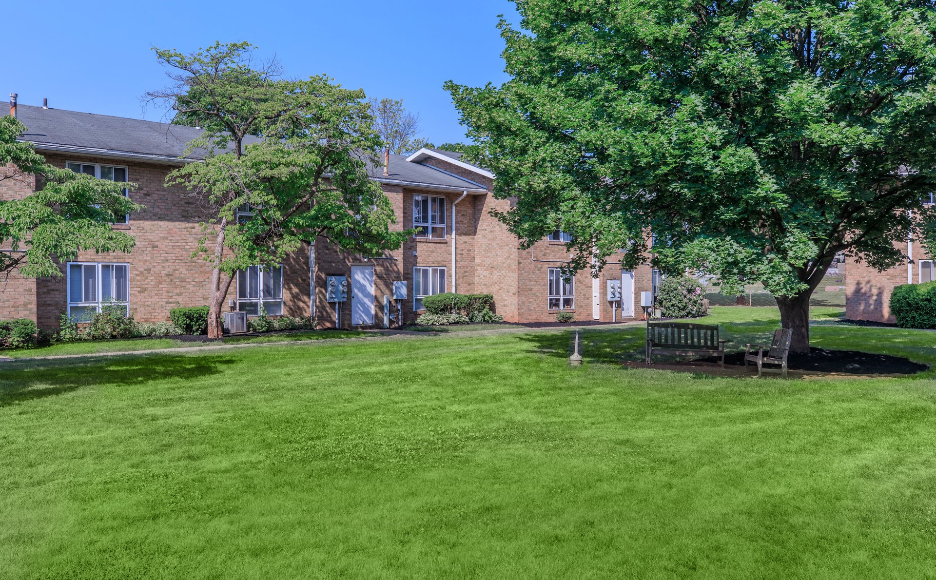 a large lawn in front of a house