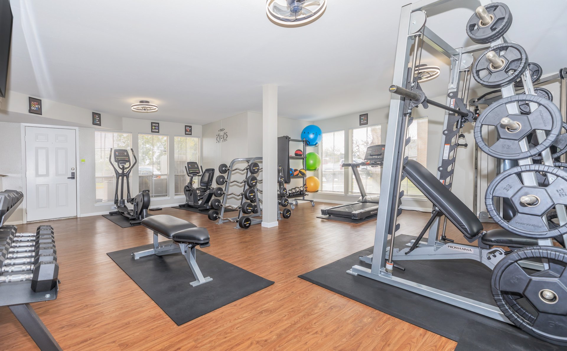 a desk with a computer on a table