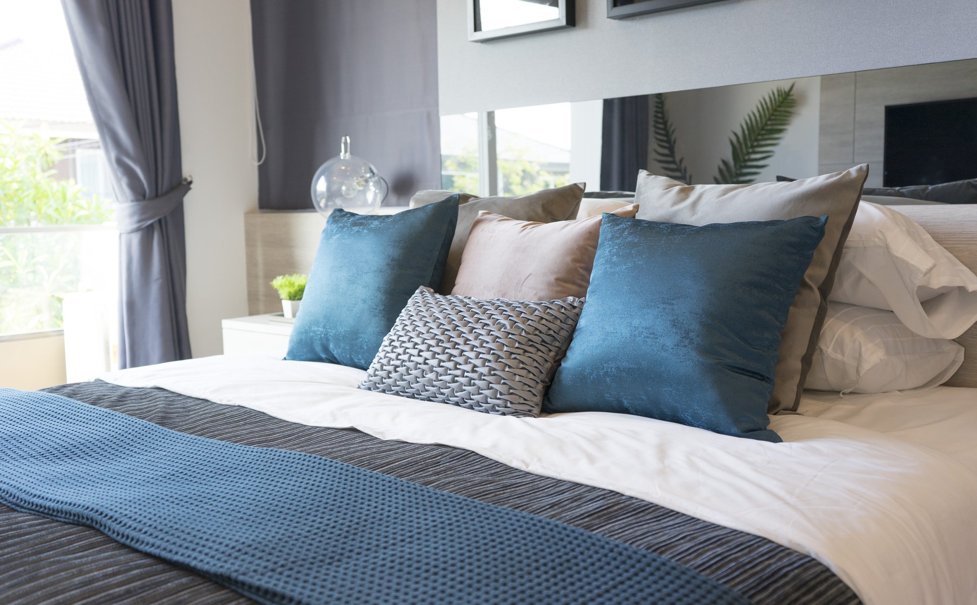 a large bed sitting in a room